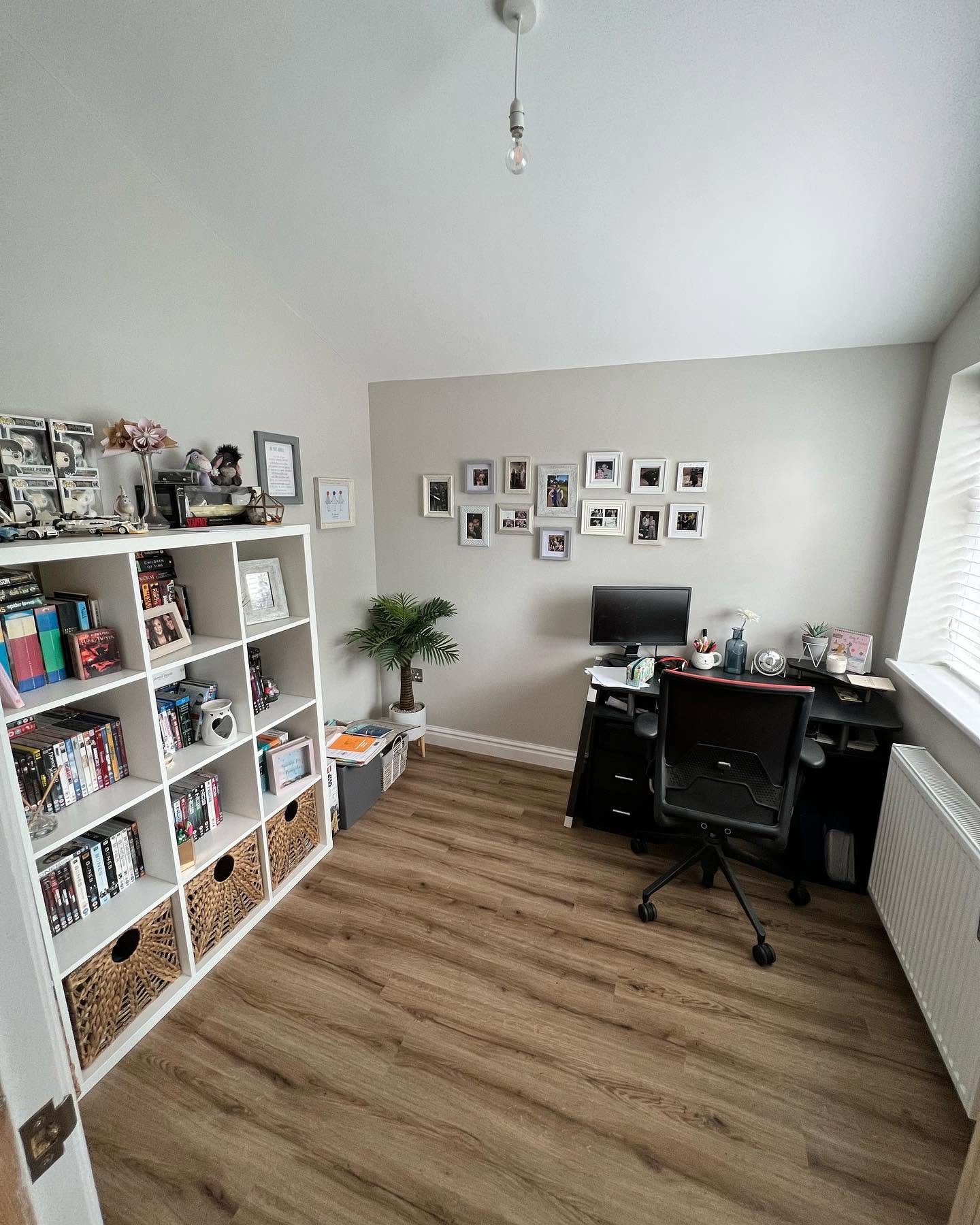 Refurbished home office with new flooring and built-in storage