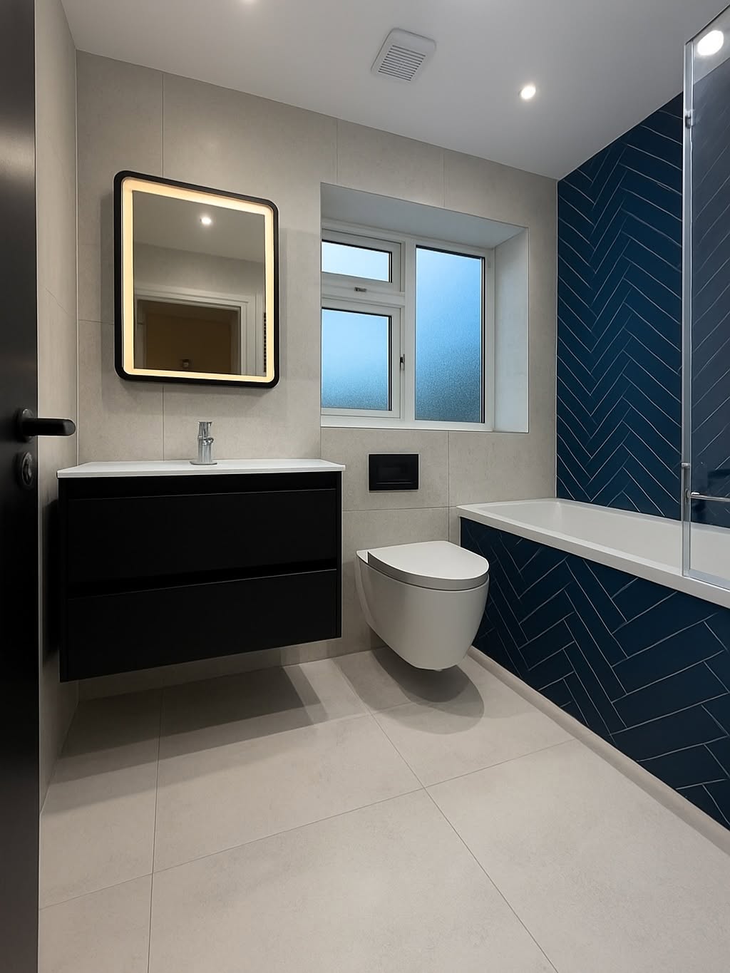 Black and navy bathroom suite with concealed toilet and vanity