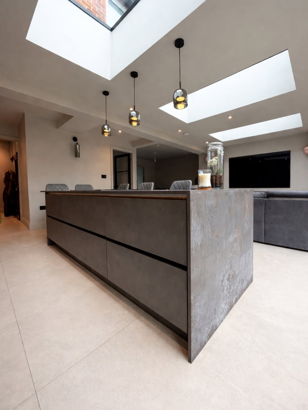 Concrete-effect island in open-plan kitchen-diner extension